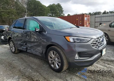 2022 Ford Edge Titanium z USA, uszkodzony, nr VIN 2FMPK4K97NBB04885